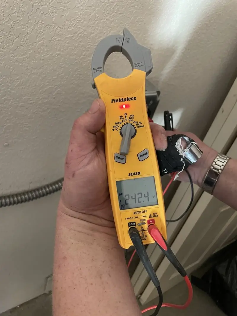 Voltage testing with clamp meter during Hot Tub / Pool Electrical Wiring in Dothan